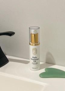 Equilibria Daily Treatment Oil Bottle on vanity