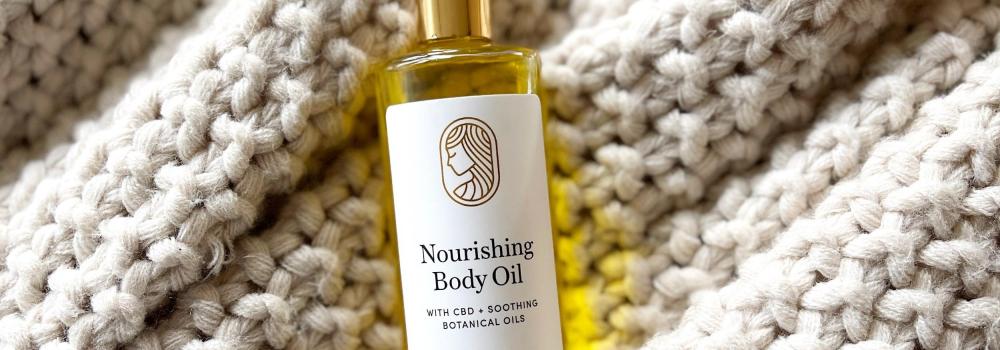 Nourishing Body Oil on blanket