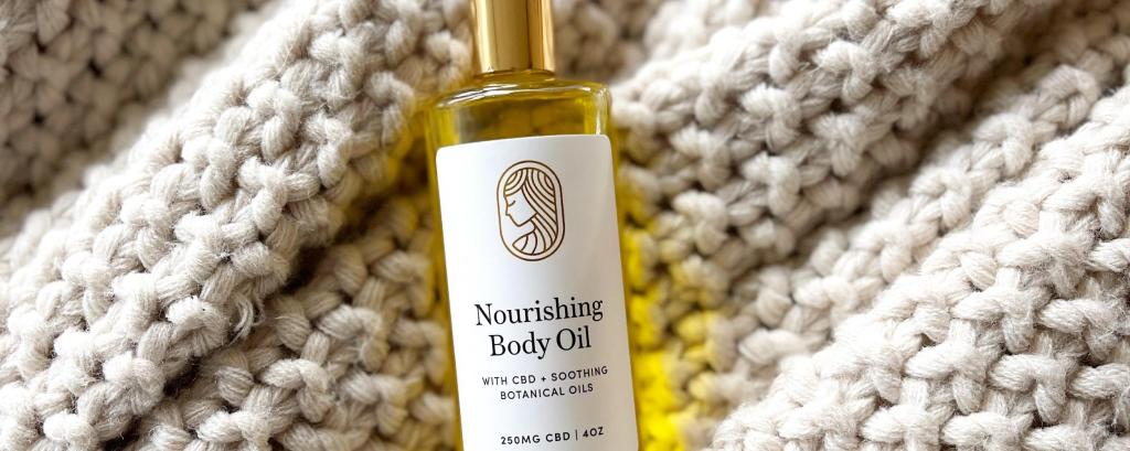 Nourishing Body Oil on blanket